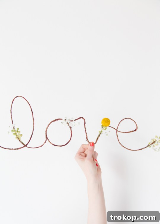 Petal-Perfect Love Craft 3 DIY floral love sign close-up | Hand-bent wire frame adorned with fresh blooms