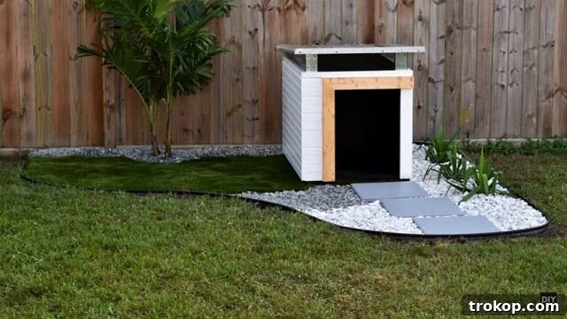 Craft the Perfect Canine Retreat: DIY Dog House Ideas 10 Contemporary Pitched Roof Dog House with Durable Construction
