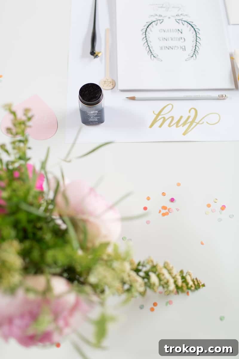 Laura Hooper demonstrating calligraphy techniques to students