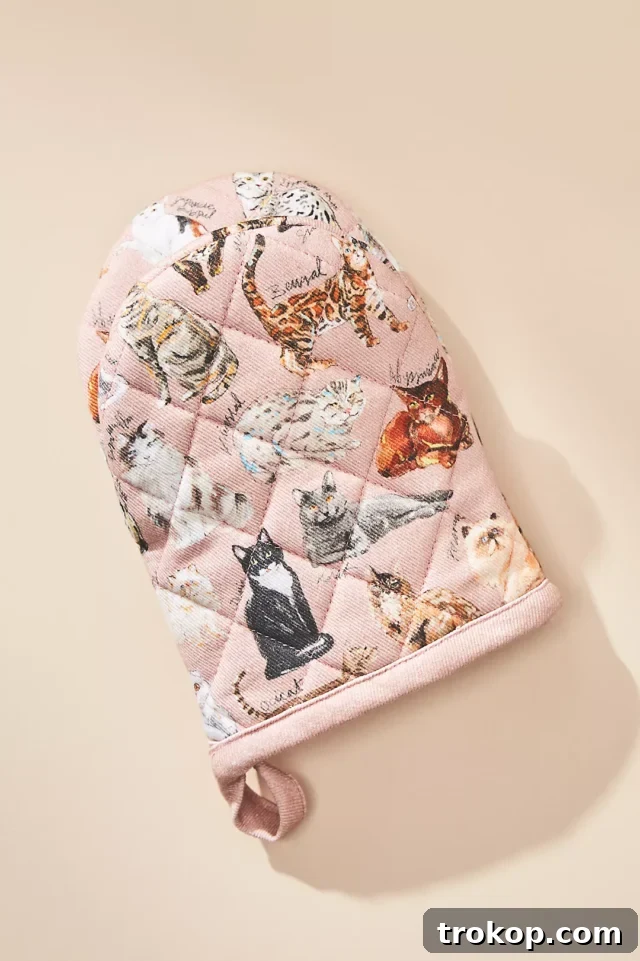 Cat Breeds A-Z Mini Oven Mitt, a stylish and practical cotton mitt for cat-loving cooks