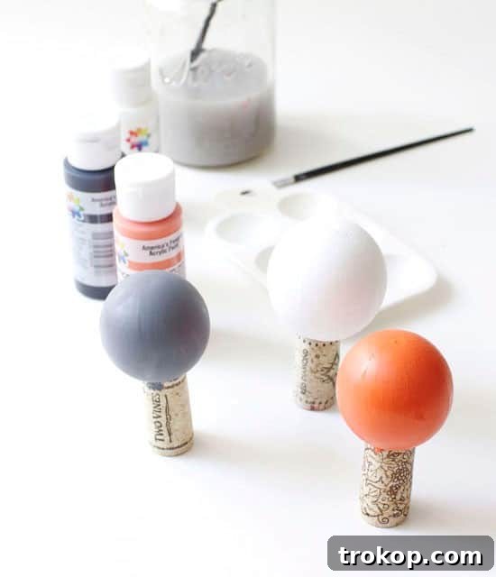 Applying the base color to a wooden knob