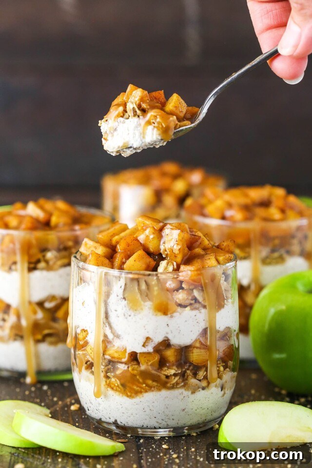 Layered no-bake caramel apple trifles with spiced apples, caramel sauce, and creamy layers, ideal for fall gatherings.