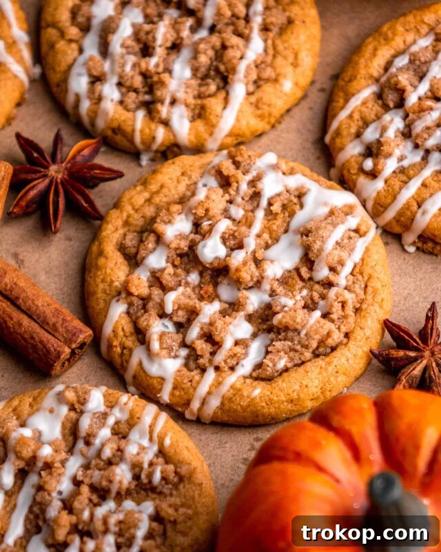 Bakery-style pumpkin coffee cake cookies: chewy, pumpkin-flavored treats with brown sugar streusel and vanilla icing drizzle.