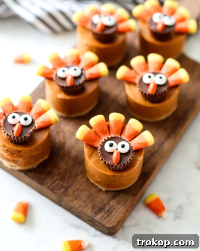 Adorable bite-sized pumpkin pie turkeys, adding a playful touch and rich spiced flavor to Thanksgiving desserts.