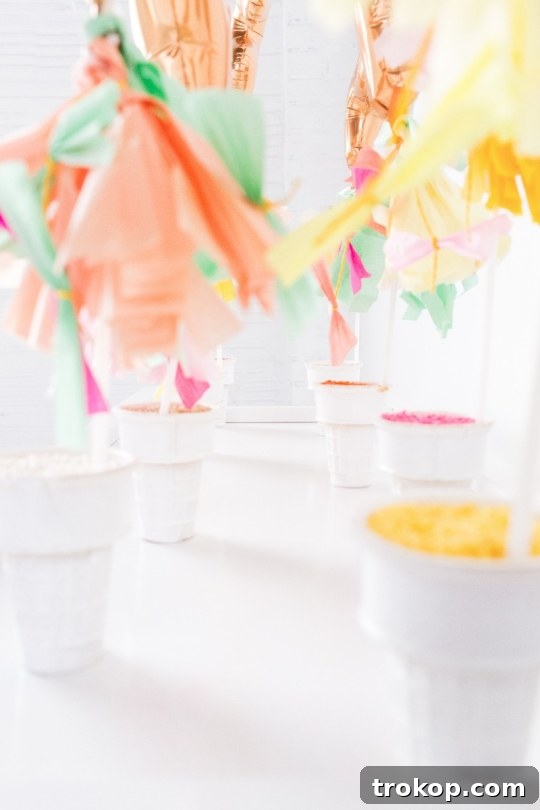 Scoop Up Fun: DIY IKEA Ice Cream Cart and Sprinkles Bar 8 Decorated ice cream cones filled with sprinkles as balloon weights