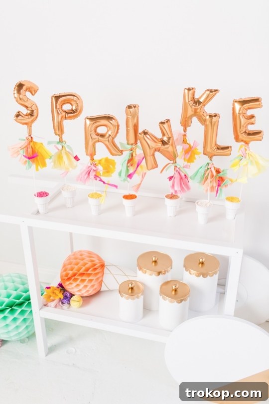 Scoop Up Fun: DIY IKEA Ice Cream Cart and Sprinkles Bar 10 Repurposed canisters with gold lids on an ice cream bar