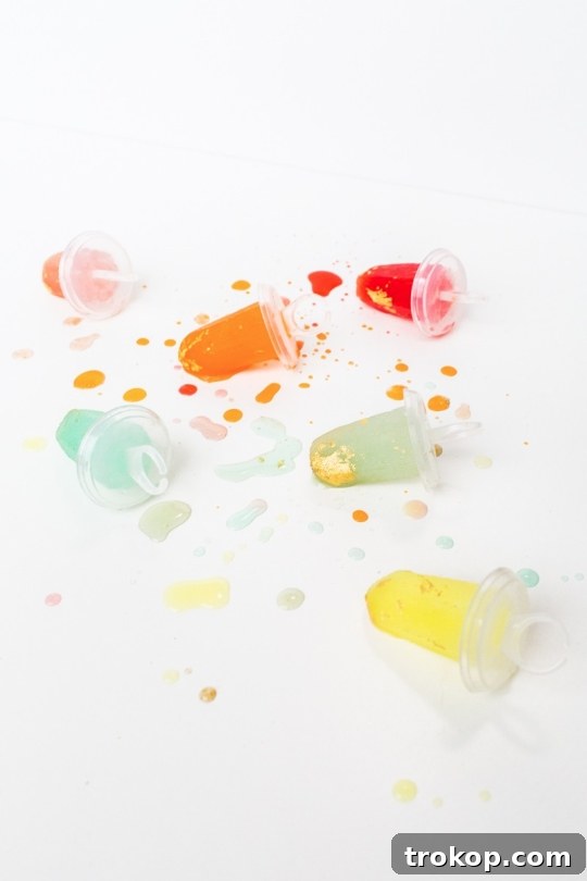 Jeweled Golden Popsicles 11 Displaying Gilded Gemstone Popsicles on Crushed Ice