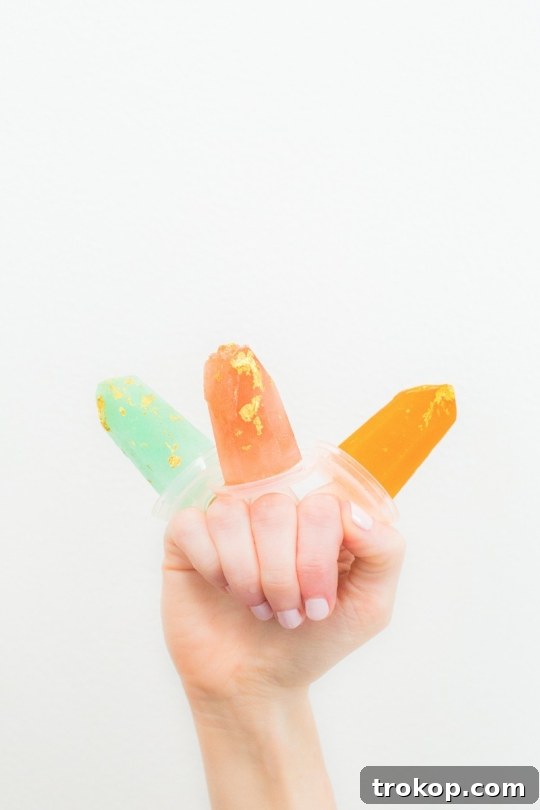 Jeweled Golden Popsicles 6 Applying Edible Gold to Popsicles