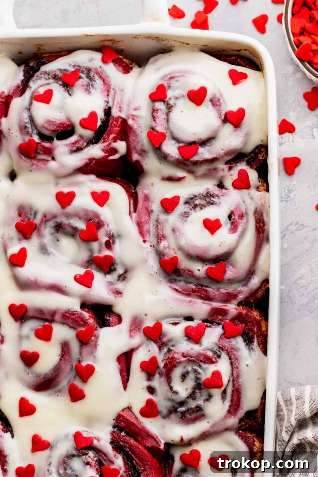 34 Irresistible Valentine's Day Treats 15 Super soft, vibrant red velvet cinnamon rolls with warm cinnamon filling and tangy cream cheese icing, perfect for a festive Valentine's Day breakfast.