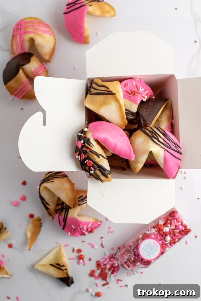 34 Irresistible Valentine's Day Treats 28 Crisp, golden homemade fortune cookies, customized with heartfelt messages and dipped in chocolate and sprinkles, a fun and personal Valentine's Day treat.