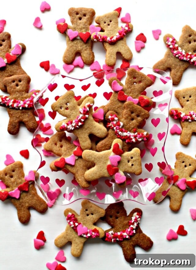 34 Irresistible Valentine's Day Treats 30 Adorable honey graham bears with tiny heart sprinkle garlands, a delightful and easy Valentine's treat perfect for school or sharing with loved ones.