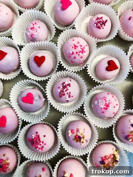 34 Irresistible Valentine's Day Treats 35 Rich, silky chocolate ganache truffles, infused with a subtle hint of espresso to enhance their deep, indulgent flavor, making a perfect decadent bite-sized Valentine's treat.