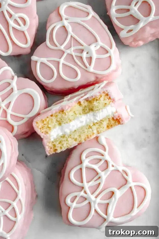 34 Irresistible Valentine's Day Treats 9 Nostalgic copycat Little Debbie Valentine cakes, heart-shaped and frosted, offering a fun homemade version of a classic holiday treat.