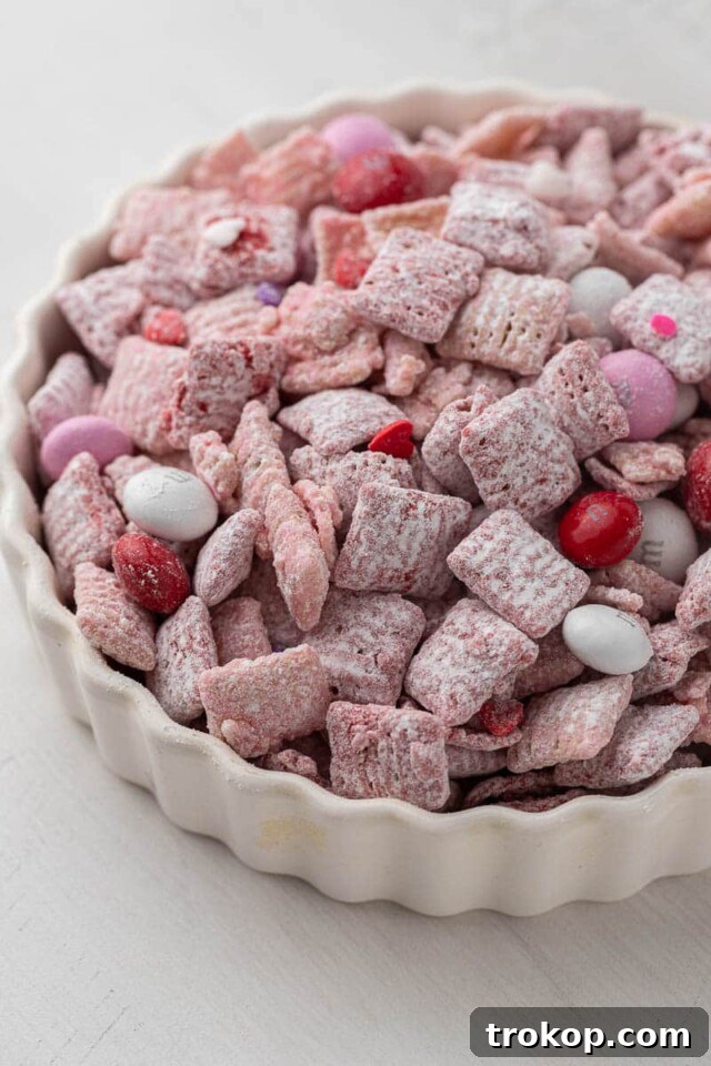 34 Irresistible Valentine's Day Treats 10 Crunchy, sweet Valentine’s Day muddy buddies, coated in candy melts, M&M's, powdered sugar, and festive sprinkles.