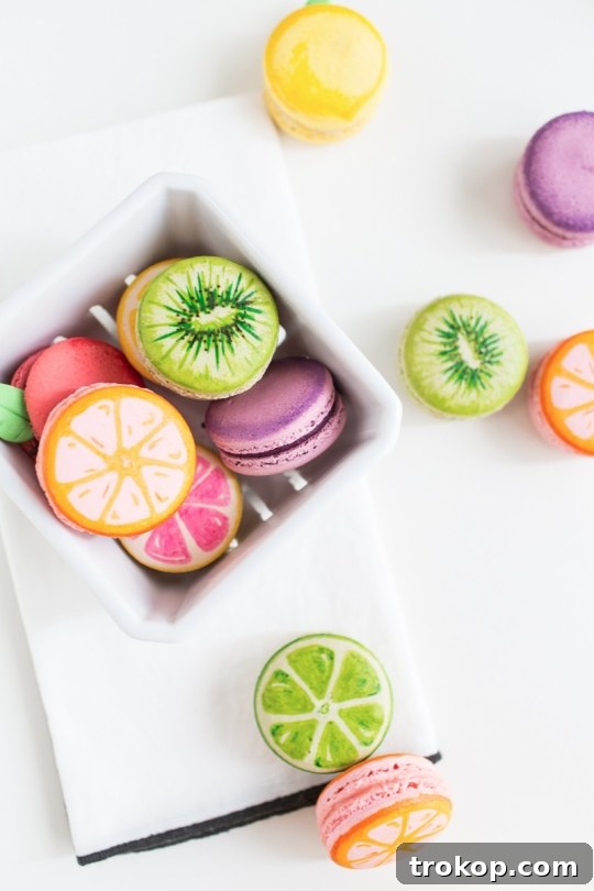A display of various fruit macarons, perfect for gifting.
