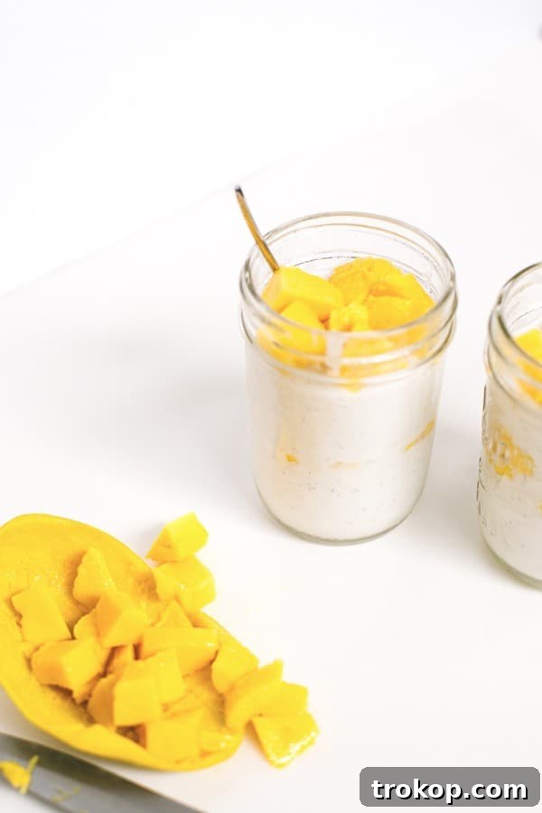 Tropical Mango Coconut Delight 8 Mango Coconut Pudding setting in individual ramekins or glasses in the refrigerator