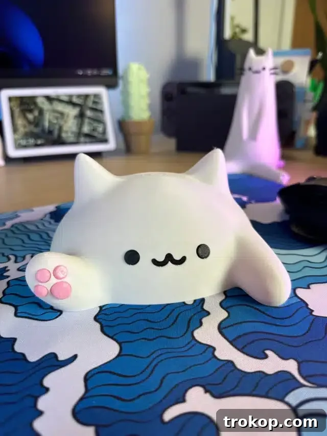 Kawaii blob cat cable hideout for cute desk accessories, a charming way to manage cables.