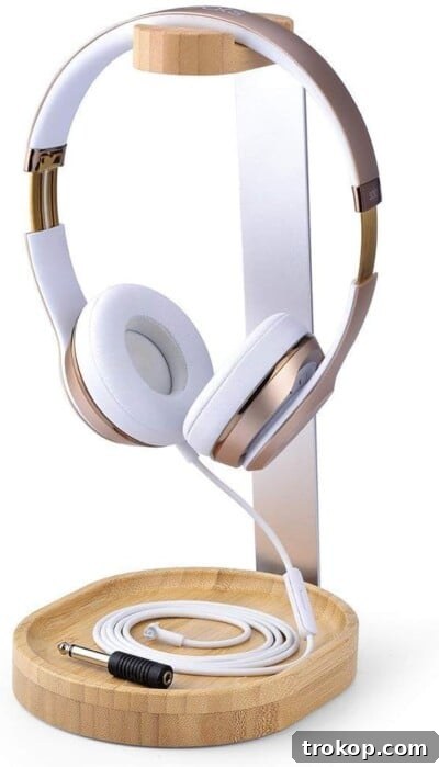 Headphone stand for desk accessories, made of wood and metal.