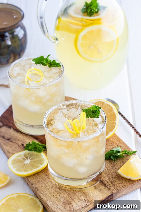 Lemonade Cocktails: 31 Refreshing Recipes You Can Easily Mix 28 Whiskey Lemonade with Honey