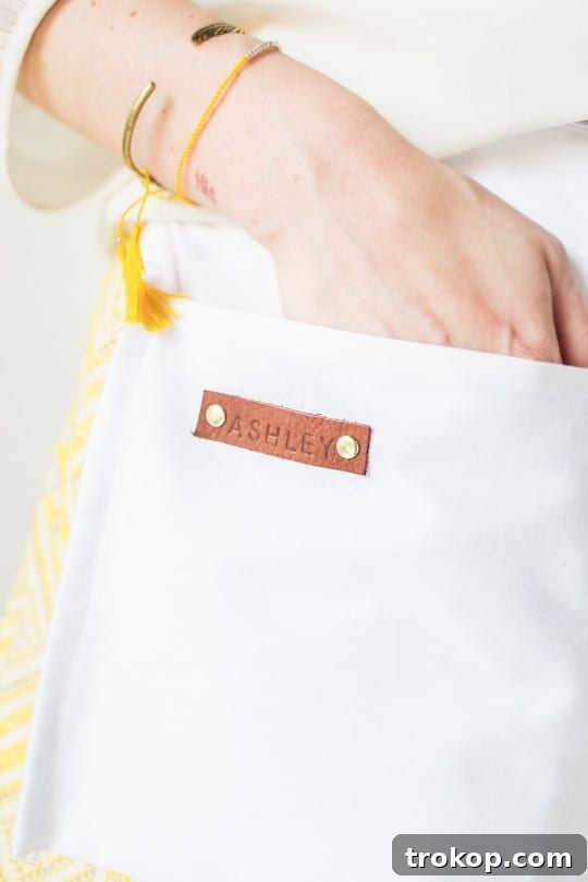Whip Up a Stitchless Apron 9 Personalized DIY no-sew apron with custom name tag