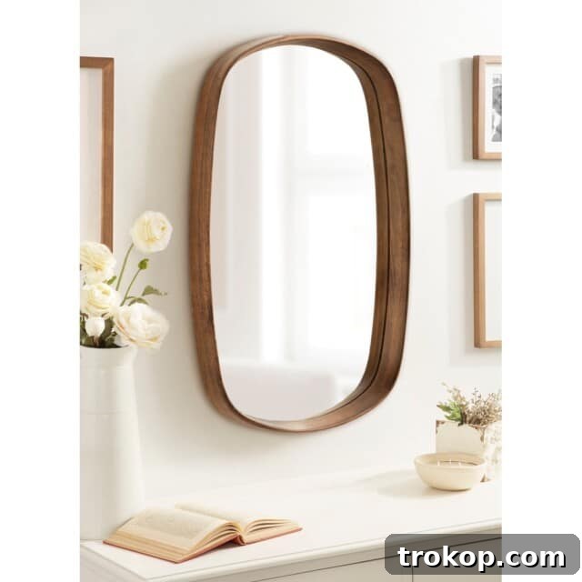 Decorative Wall Mirrors So Stunning, You'll Wonder Where They've Been All Your Life 18 Kate and Laurel Prema Framed Wall Mirror crafted from solid mango wood