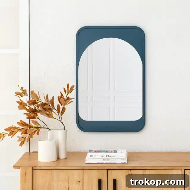 Decorative Wall Mirrors So Stunning, You'll Wonder Where They've Been All Your Life 22 Kofi Wall Mounted Accent Mirror in modern hues