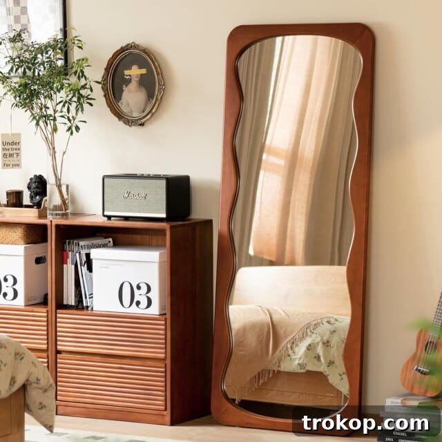 Decorative Wall Mirrors So Stunning, You'll Wonder Where They've Been All Your Life 32 Midcentury Full Length Wall Mirror with wavy teak-colored frame