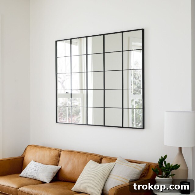 Decorative Wall Mirrors So Stunning, You'll Wonder Where They've Been All Your Life 8 Raven Window Metal Wall Mirrors with industrial-chic design