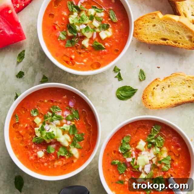 Refreshing chilled watermelon gazpacho in a bowl, garnished with mint