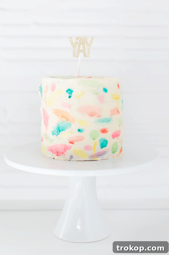 DIY Abstract watercolor painted cake | sugarandcloth.com