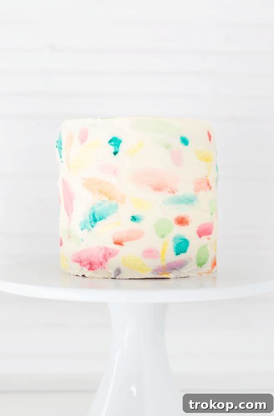 DIY Abstract watercolor painted cake | sugarandcloth.com