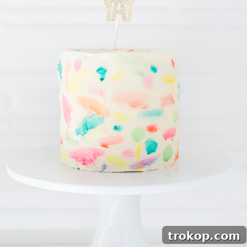 DIY Abstract watercolor painted cake | sugarandcloth.com
