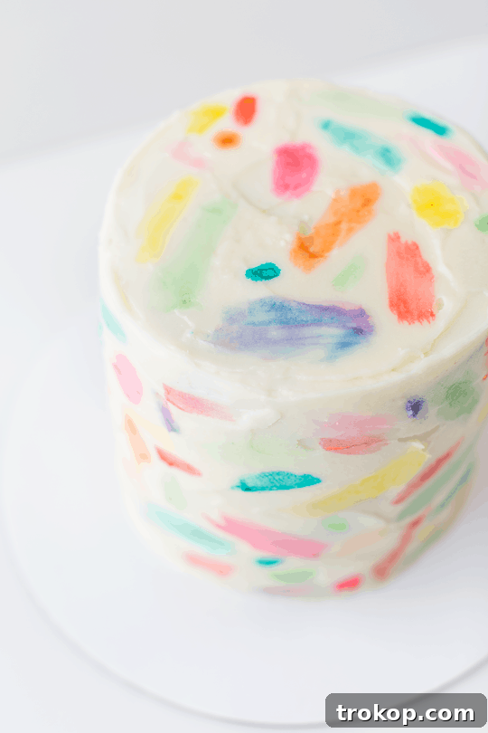 DIY Abstract watercolor painted cake | sugarandcloth.com