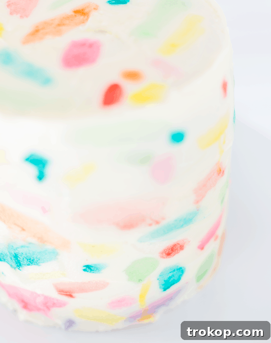 DIY Abstract watercolor painted cake | sugarandcloth.com
