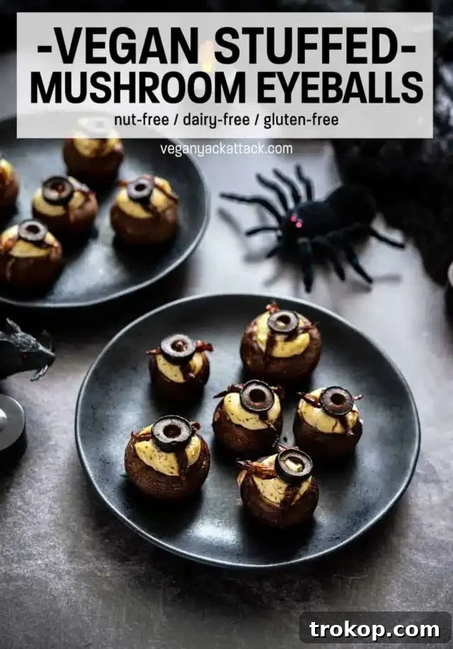 Ghoulishly Good Halloween Party Bites 17 Stuffed Mushroom Eyeballs for Halloween food ideas