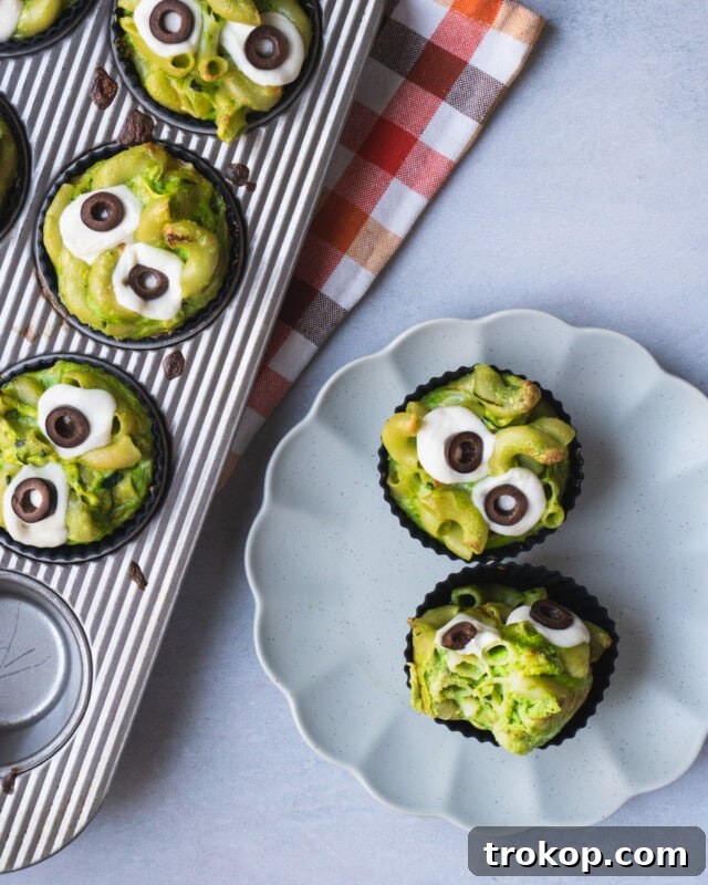 Ghoulishly Good Halloween Party Bites 20 Monster Mac and Cheese Cups for Halloween side dishes