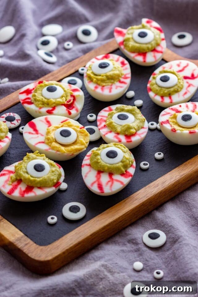 Ghoulishly Good Halloween Party Bites 3 Eyeball Deviled Eggs for Halloween food ideas