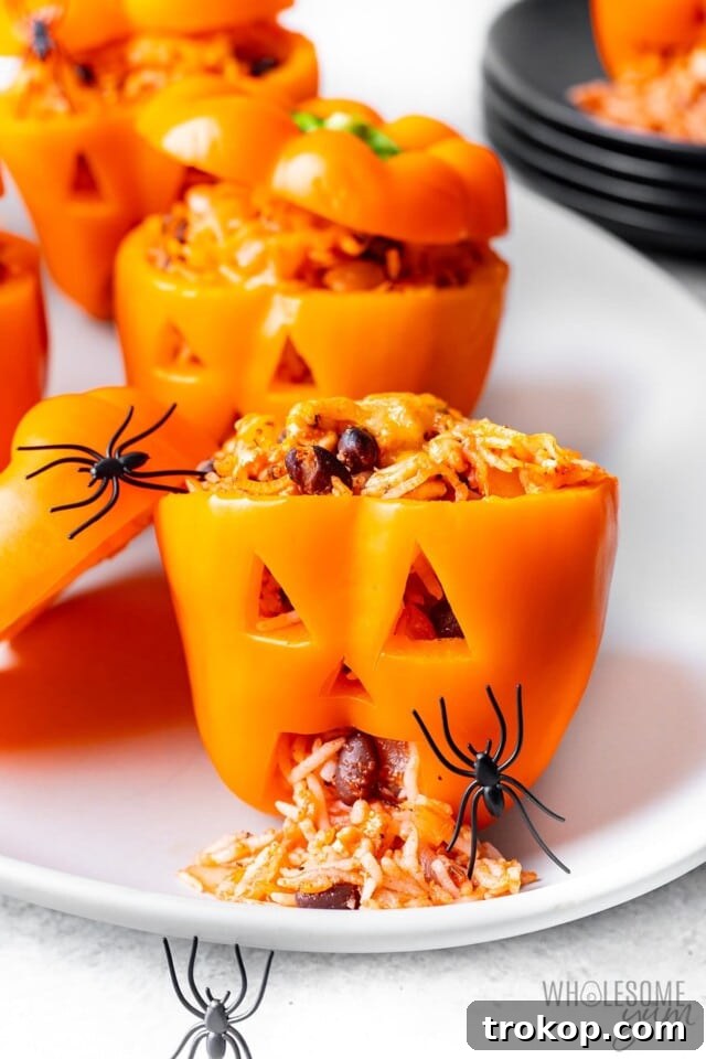 Ghoulishly Good Halloween Party Bites 25 jack-o-lantern stuffed peppers recipe for halloween recipes