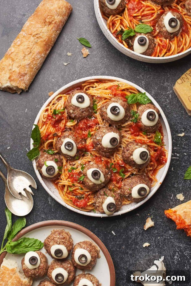 Ghoulishly Good Halloween Party Bites 29 Halloween Pasta (Spooky Spaghetti with Meatball Eyeballs)