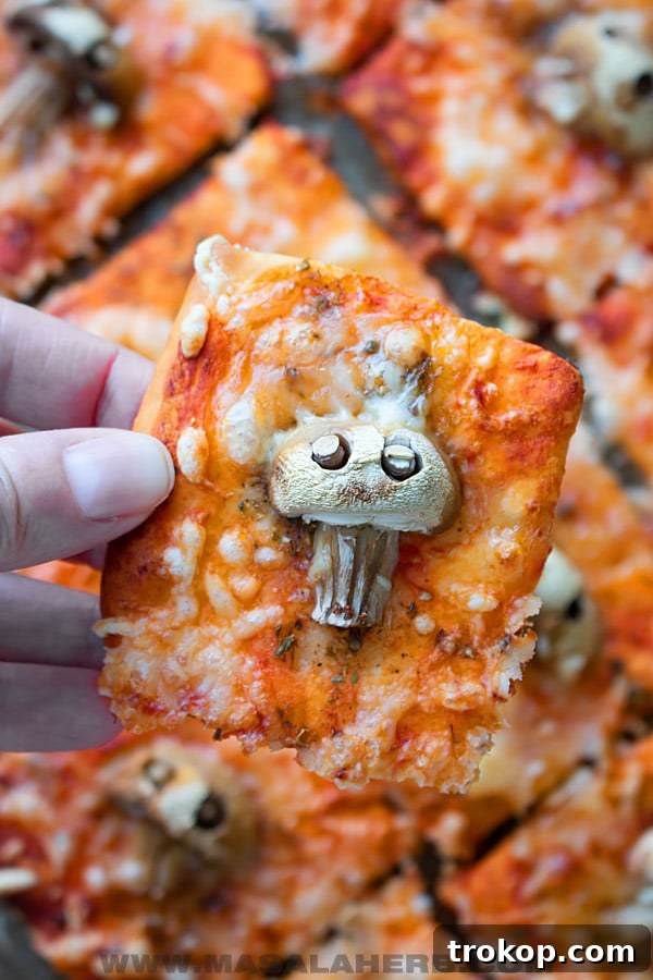 Ghoulishly Good Halloween Party Bites 46 Skull Mushroom Pizza