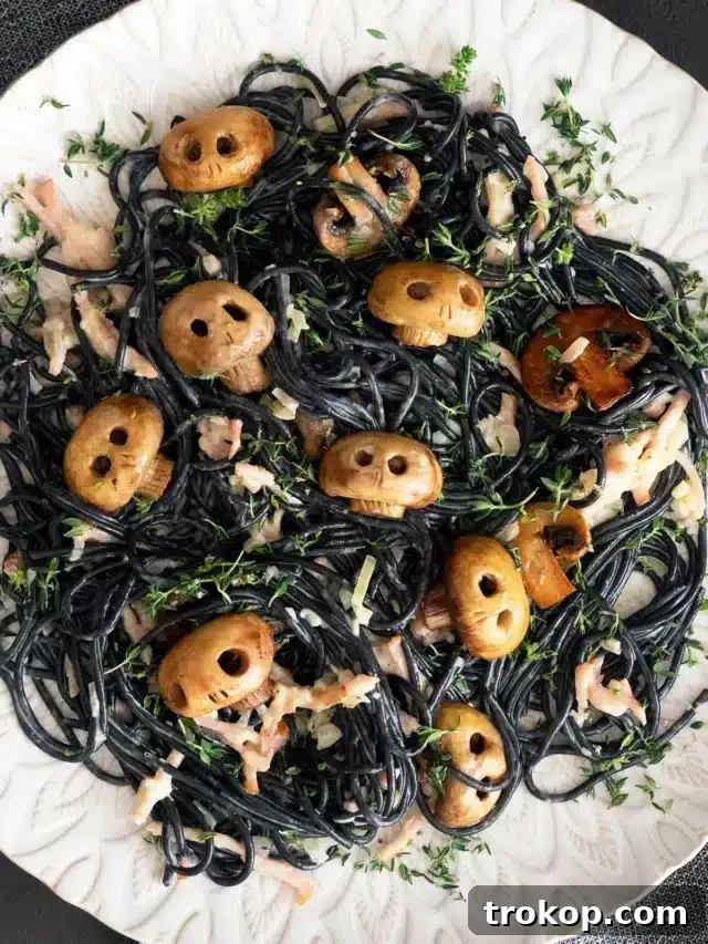 Ghoulishly Good Halloween Party Bites 47 Squid Ink Mushroom Skulls Pasta Recipe for Halloween Food Ideas