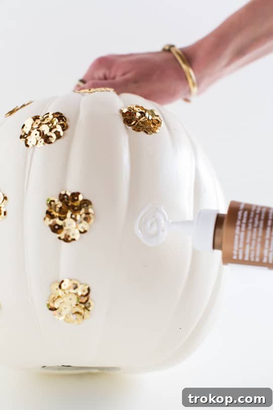 Sparkling Polka Dot Pumpkin Craft 4 Applying glue for sequin polka dot pumpkin