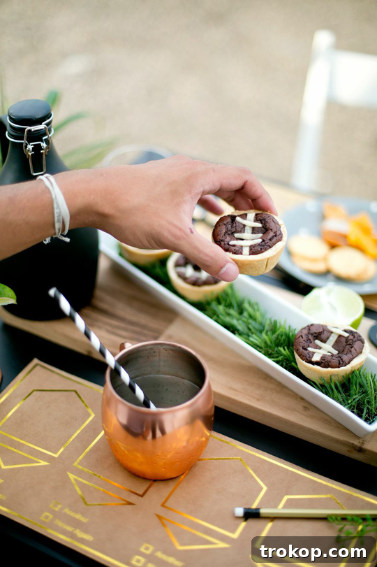Score Big: Football Brownies and Smokey Bottom Cocktail for Your Football Bash 13 a DIY rooftop football watch party | sugarandcloth.com