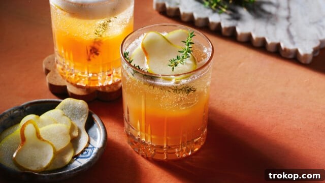 Holiday Cheer: Thanksgiving Cocktails to Toast the Season 14 Spiced pear spritz for best thanksgiving drinks