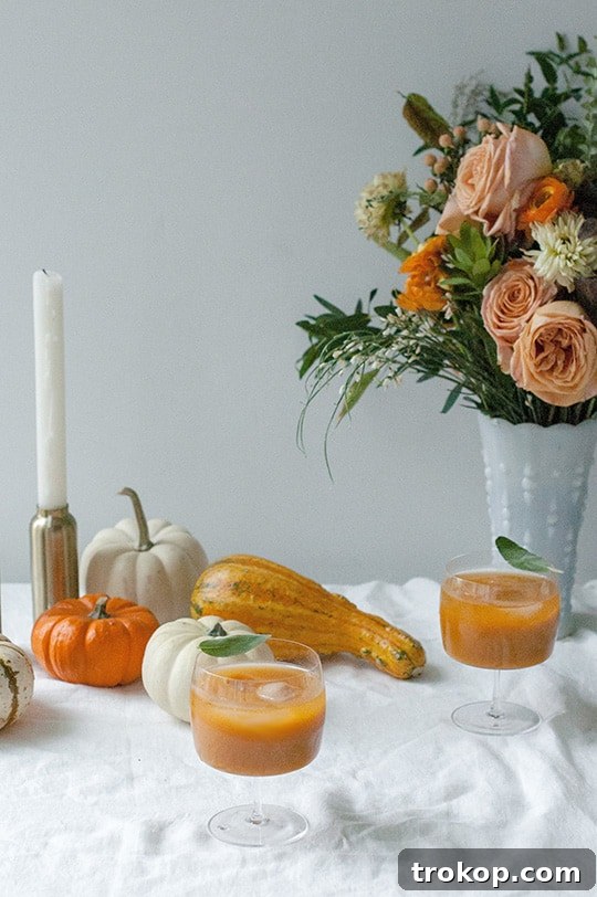 Holiday Cheer: Thanksgiving Cocktails to Toast the Season 21 Persimmon Pumpkin Punch for Thanksgiving cocktails