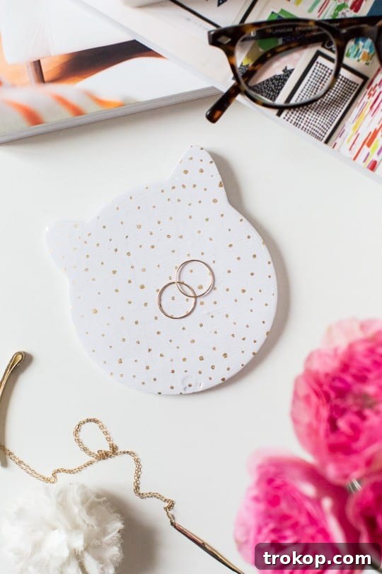 Craft Your Own Kitty Keepsake Dish 4 Craft supplies for making a DIY cat trinket dish, including clay, rolling pin, and cookie cutter