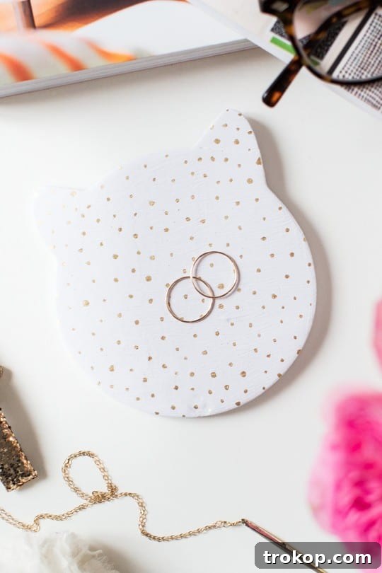 Craft Your Own Kitty Keepsake Dish 8 A collection of handmade cat trinket dishes, showing various decorative options