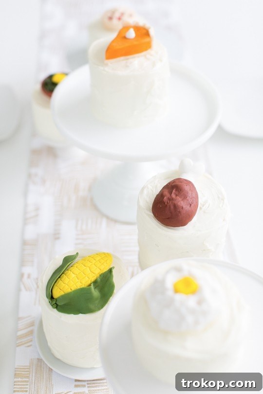 Thanksgiving dinner cake toppers by Alana Jones Mann, complementing the gold leaf napkin rings