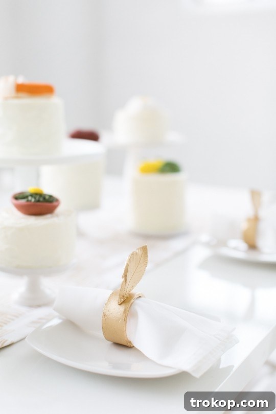 Thanksgiving table decorated with handmade gold leaf napkin rings and unique elements