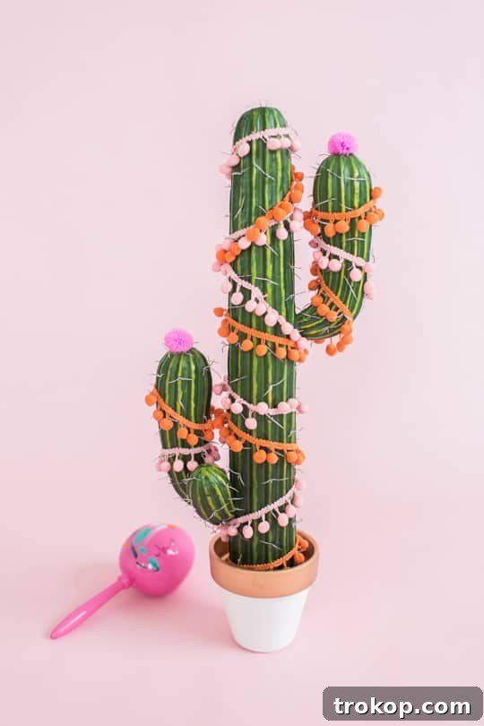Supplies laid out for decorating a DIY Christmas tree cactus.